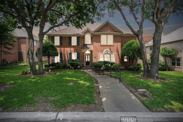 view of front of house featuring a yard