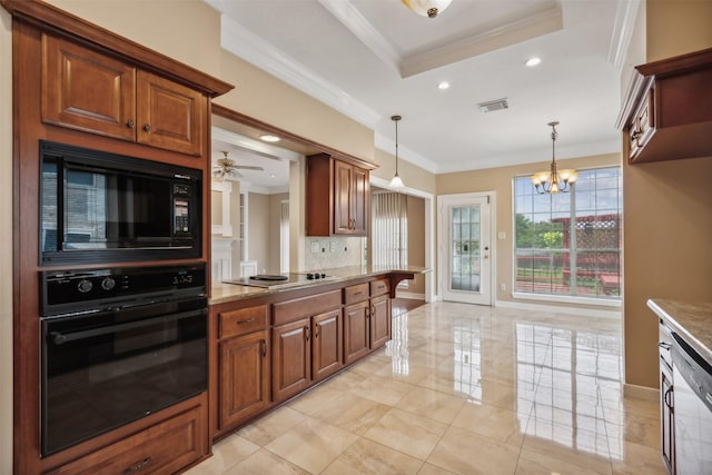 kitchen featuring tasteful backsplash, ornamental molding, decorative light fixtures, and black appliances