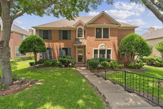 view of front of property with a front lawn