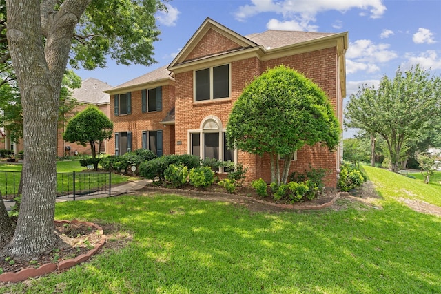 view of front of home with a front yard