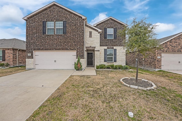 view of front property featuring a garage and a front yard