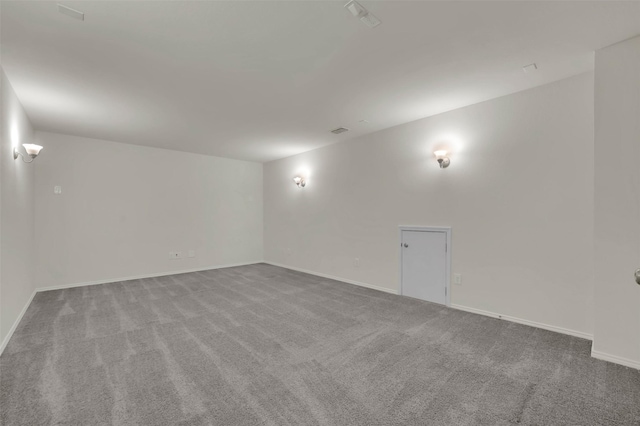 empty room with light colored carpet