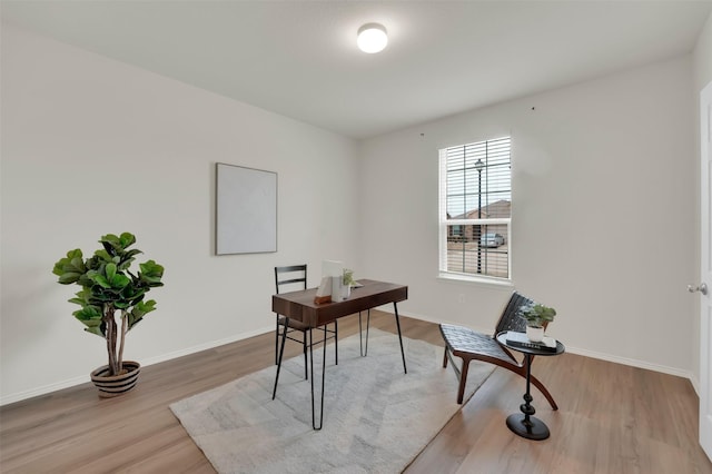 office space featuring light wood-type flooring