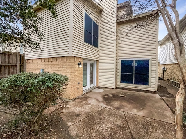 rear view of property with a patio area