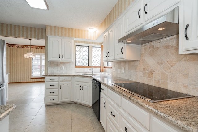 kitchen featuring pendant lighting, sink, black appliances, and white cabinets