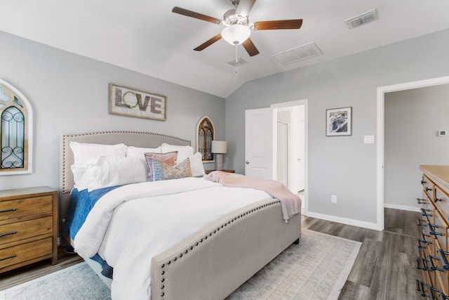 bedroom featuring lofted ceiling, dark hardwood / wood-style floors, and ceiling fan