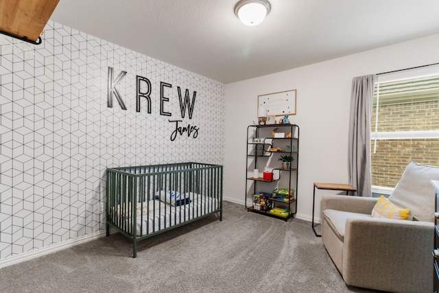 carpeted bedroom with a crib