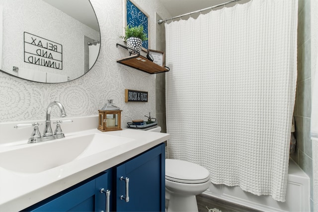 full bathroom with vanity, toilet, wood-type flooring, and shower / bath combo with shower curtain