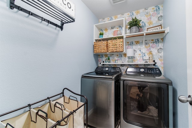 washroom featuring washer and dryer