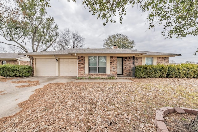 ranch-style house featuring a garage