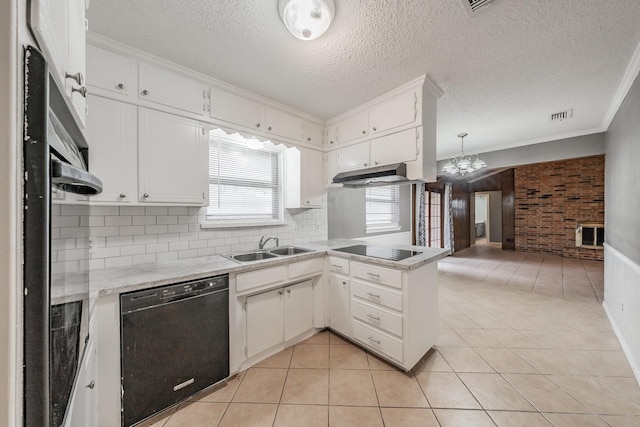 kitchen with white cabinetry, light tile patterned floors, black appliances, and kitchen peninsula