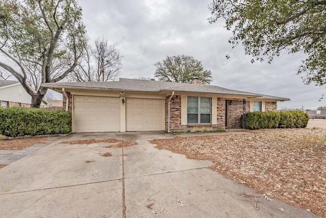 ranch-style home with a garage