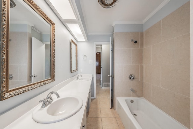 bathroom with tiled shower / bath combo, crown molding, vanity, and tile patterned floors