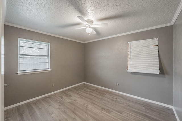 unfurnished room with crown molding, a textured ceiling, ceiling fan, and light wood-type flooring