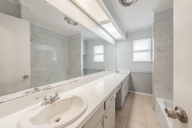 bathroom featuring crown molding, tile patterned flooring, a skylight, vanity, and tiled shower / bath