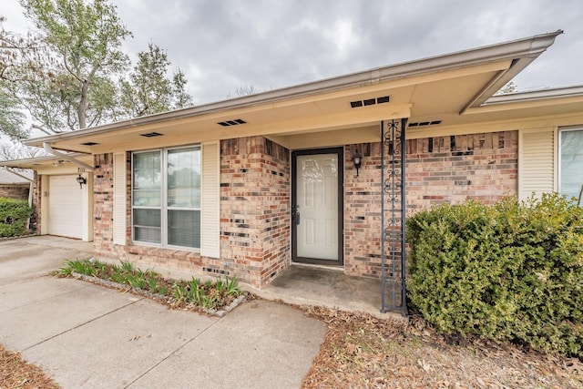 entrance to property with a garage