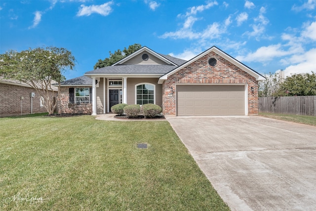 ranch-style home with a garage, a front yard, and a porch