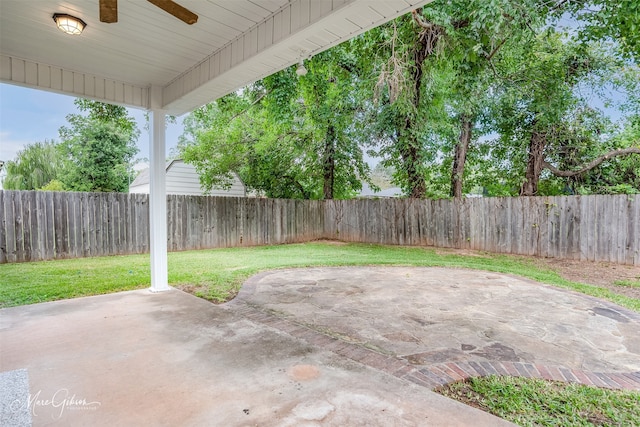 view of patio featuring ceiling fan