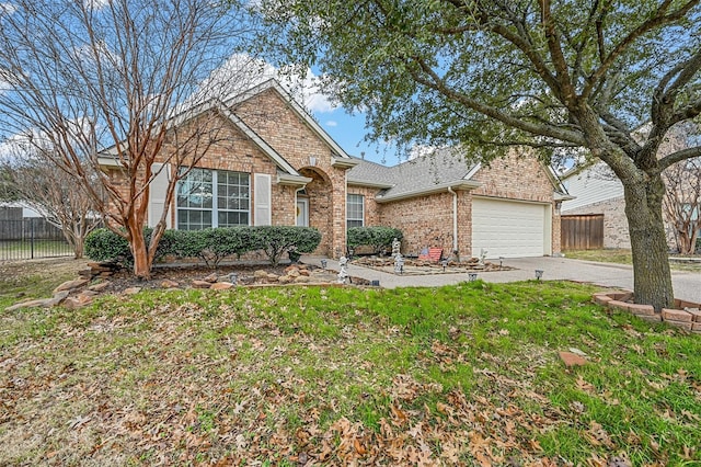 single story home with a garage and a front yard