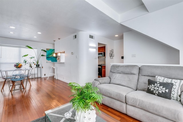 living room with hardwood / wood-style flooring