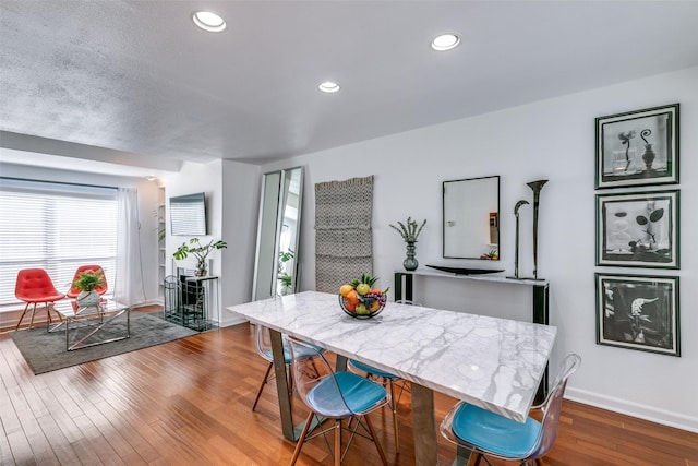 dining area featuring hardwood / wood-style floors