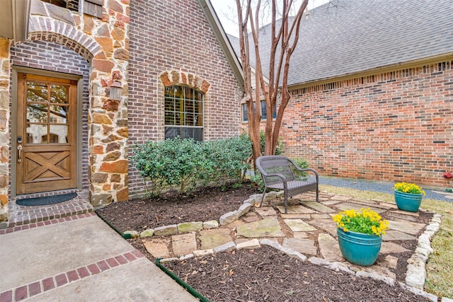 entrance to property featuring a patio area