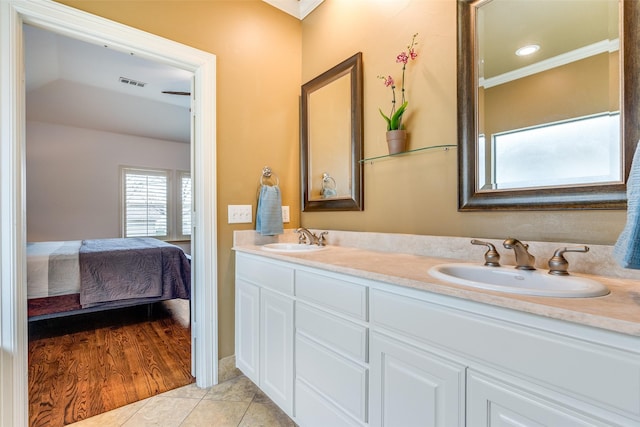 bathroom with vanity and tile patterned floors