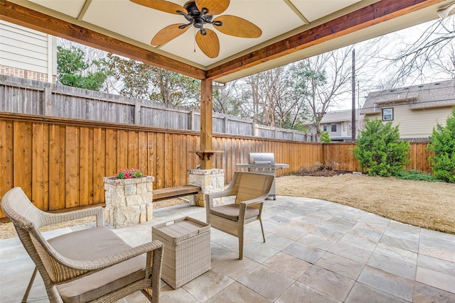 view of patio featuring ceiling fan and area for grilling