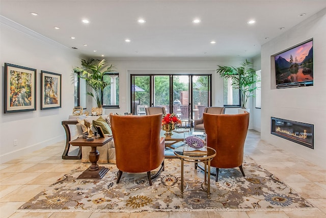 interior space featuring ornamental molding, light tile patterned flooring, and a fireplace