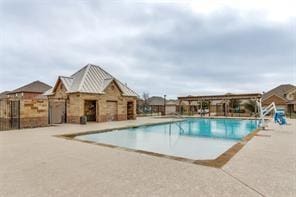 view of pool featuring a patio area