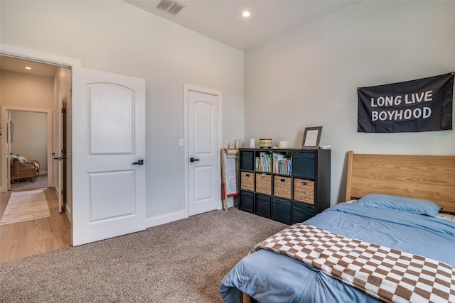 bedroom featuring recessed lighting, baseboards, visible vents, and carpet flooring