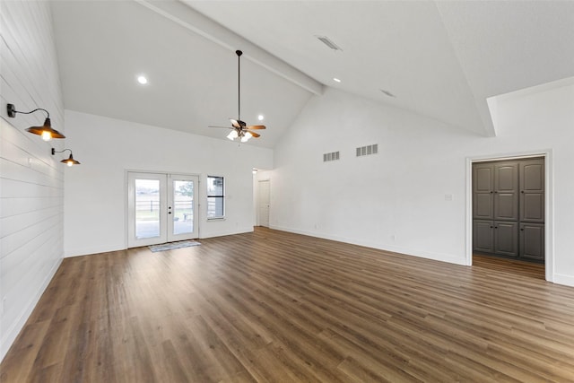 unfurnished living room with french doors, high vaulted ceiling, dark hardwood / wood-style floors, beamed ceiling, and ceiling fan