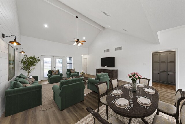 dining room with high vaulted ceiling, beamed ceiling, wood-type flooring, ceiling fan, and french doors