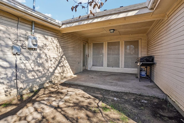 property entrance with a patio area