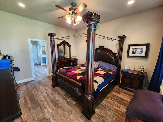 bedroom featuring ceiling fan and dark hardwood / wood-style flooring