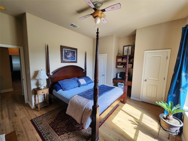 bedroom featuring ceiling fan and light wood-type flooring