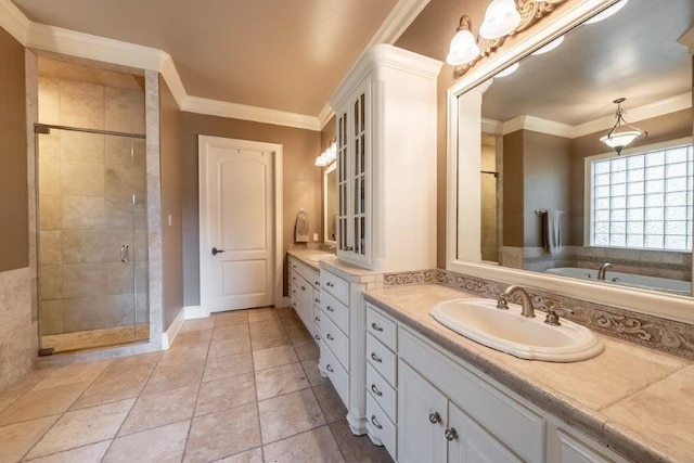 bathroom with ornamental molding, an enclosed shower, tile patterned floors, and vanity