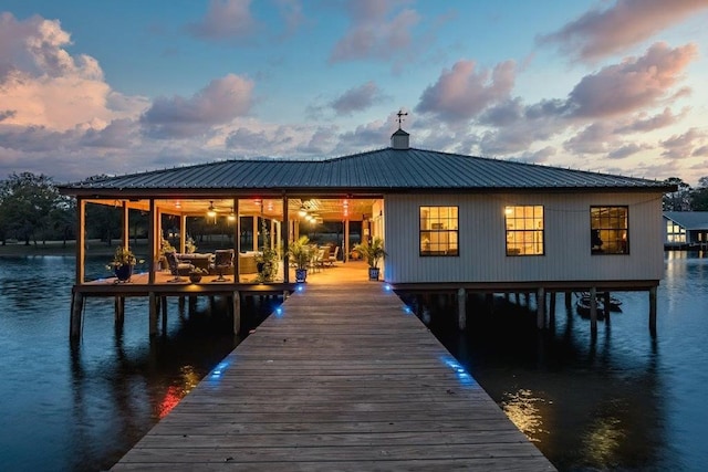 view of dock with a water view