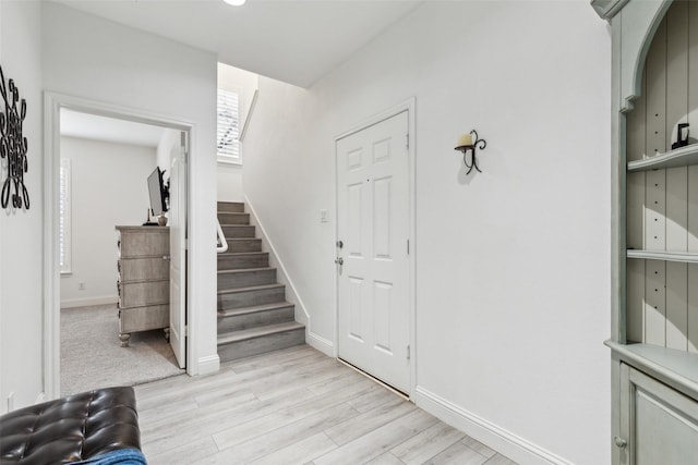 foyer entrance featuring light hardwood / wood-style floors