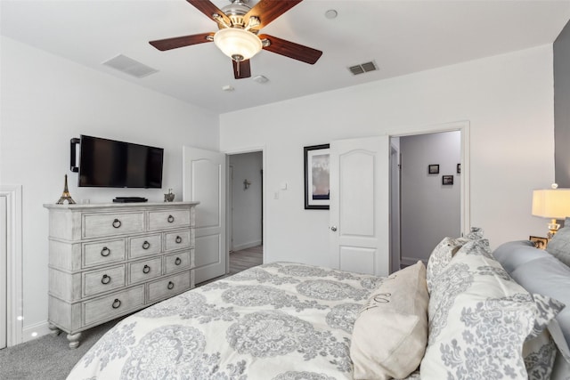 bedroom featuring ceiling fan and carpet flooring