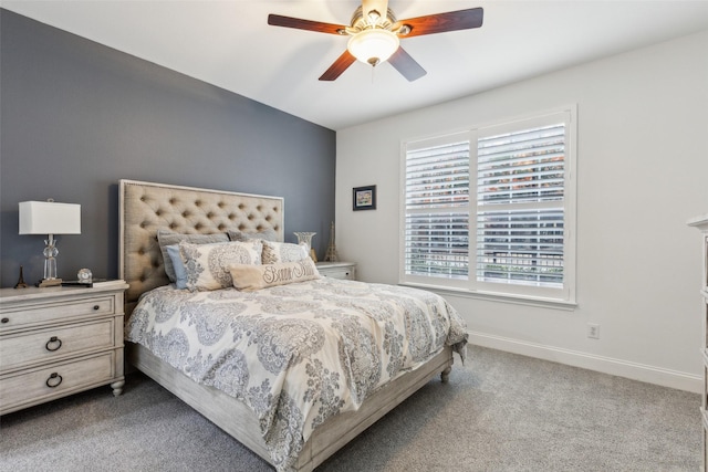 bedroom with light colored carpet and ceiling fan