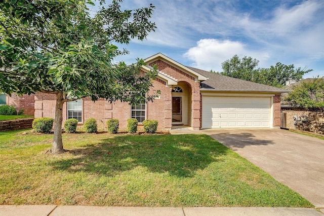 view of front facade featuring a garage and a front lawn