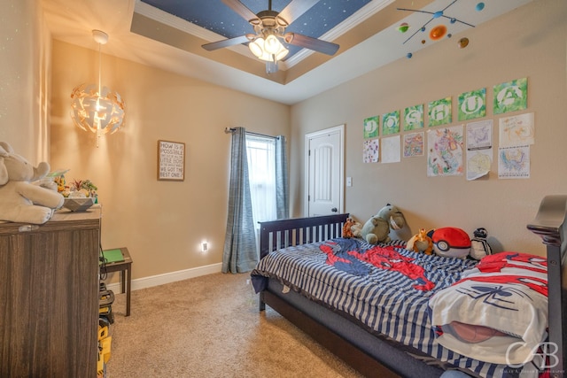 bedroom featuring a raised ceiling, ornamental molding, and light carpet