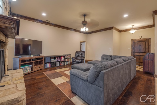 living room with dark wood-type flooring, ceiling fan, and ornamental molding