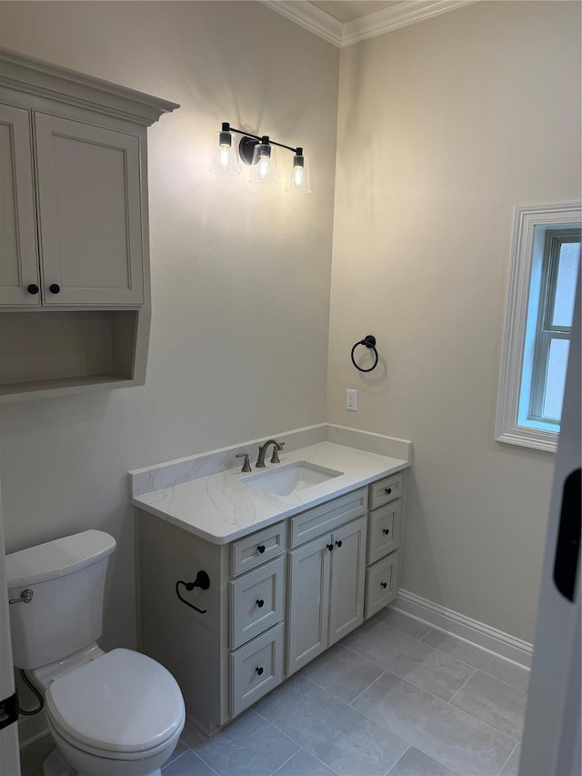 109 Katy Ln, Bossier City, LA 71111 - half bathroom with tile patterned flooring, baseboards, toilet, ornamental molding, and vanity
