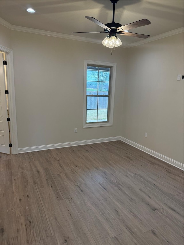 109 Katy Ln, Bossier City, LA 71111 - unfurnished room with crown molding, baseboards, and wood finished floors