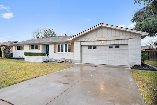 single story home featuring a garage and a front yard