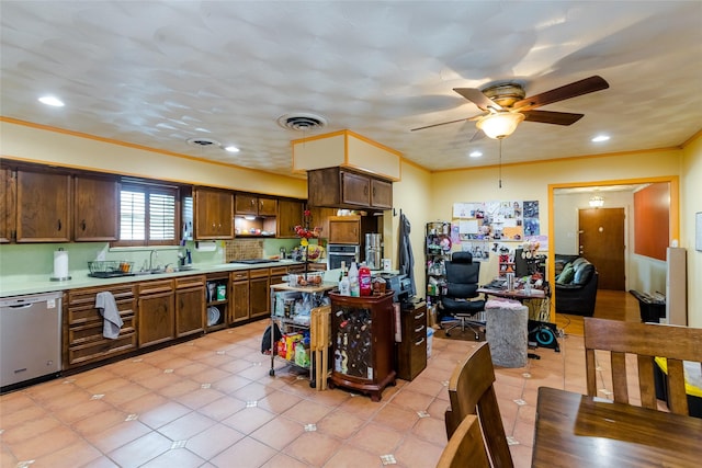 kitchen with light tile patterned floors, sink, ceiling fan, stainless steel appliances, and ornamental molding