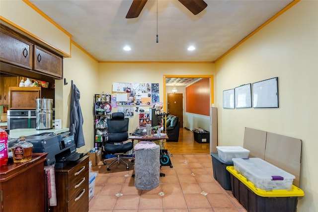 tiled office space with ornamental molding and ceiling fan