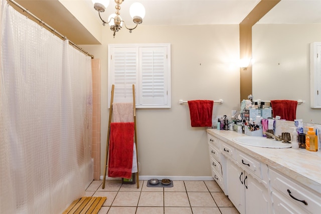 bathroom featuring vanity, shower / bath combo, tile patterned floors, and a chandelier